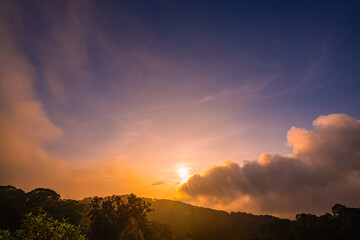 scenery sweet sky at twilight above The hills in the foreground add depth and contrast to the misty...