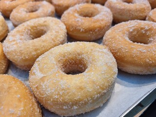 Sweet Sugar-Coated Donuts on Baking Sheet