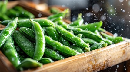 Vibrant green peas glistening with water droplets in a rustic wooden box, symbolizing freshness and health in the context of farm-to-table food and natural produce.