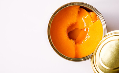 Open Tin Or Can Of Sliced Peaches Dessert Or Cooking Ingredients