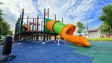 Slider bar toy outdoor playground, exercise of motor development. Outdoors, development and portrait of kids for playing, freedom and summer adventure with smile.