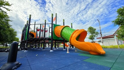 Slider bar toy outdoor playground, exercise of motor development. Outdoors, development and portrait of kids for playing, freedom and summer adventure with smile.