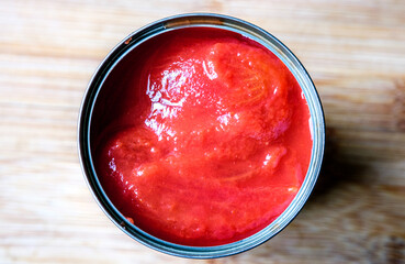 London UK, June 06 2025, Open Tin Of Plum Tomatoes Ready To Cook