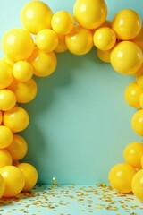 Yellow balloon arch with confetti, golden streamers , background, arch, bright