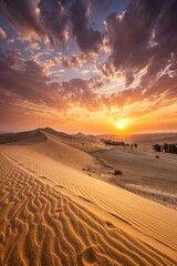The setting sun casts a brilliant glow over the dunes