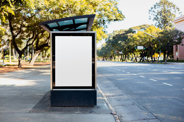 A vertical blank billboard at a bus stop shelter in Buenos Aires, Argentina along Libertador avenue...