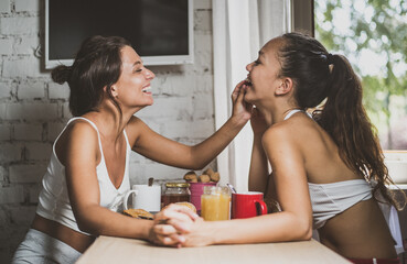 Homosexual couple lifestyle moments at home. Conceptual photo about homosexuality