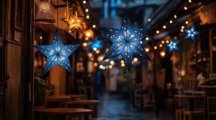 Obraz premium Blue star lanterns illuminate night market alley