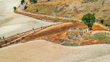 summer countryside landscape with the midday light inside Val D'Agri, Basilicata