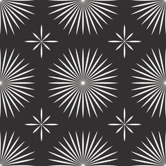 Seamless geometric starburst pattern in white on dark gray background