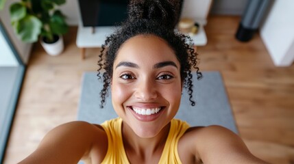 A smiling person taking a selfie.