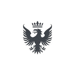 Obraz premium Black heraldic eagle with crown symbolizes power and nobility, featuring detailed wings and fierce expression. design is bold and striking against plain background