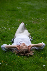 Woman lying on the grass 