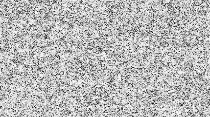 Black and white speckled texture. Detailed high-resolution image shows small black specks on white background. This granite-like texture is ideal for design projects needing a neutral backdrop.