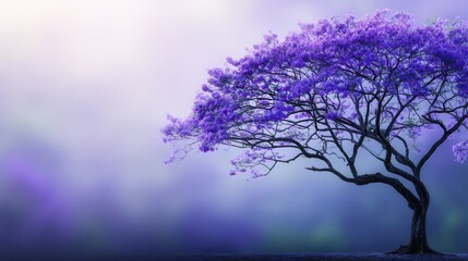 Majestic purple tree in a misty landscape (1)