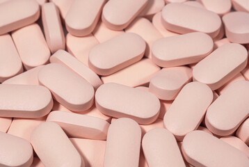 Medical tablets of pink close up