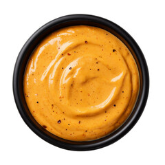 smoked paprika aioli in black bowl top view isolated