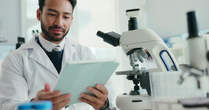 Scientist, man and microscope with tablet for report, breakthrough or medical research test. Biotech, laboratory and chemistry with DNA solution for pharmaceutical RNA or forensic experiment study