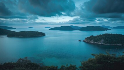 Fototapeta premium A beautiful view of nature with a calm, blue sea and islands