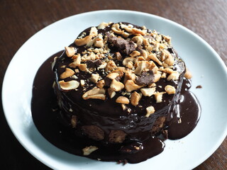 chocolate cake with cashew nuts topping