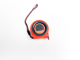 Black and orange measuring tape that can be stretched and held at a distance of 10 cm, measuring...