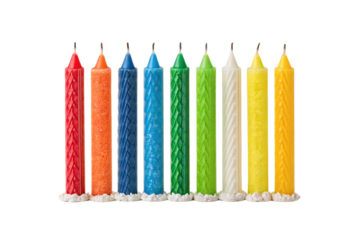 Unlit birthday candles colorful rainbow variety textured patterns celebration party decoration festive vertical standing, isolated on a transparent background