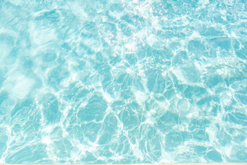 Bright aqua water with soft light reflections