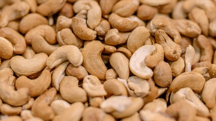 close up of background organic cashew nuts, roasted salted cashew for snack, healthy eating, delicious breakfasts