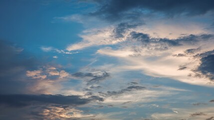Obraz premium Serene Golden Dusk Blue Cloudy Sky Background – Warm-Cool Color Harmony, Soft Cloud Glows, Tranquil Evening Atmosphere