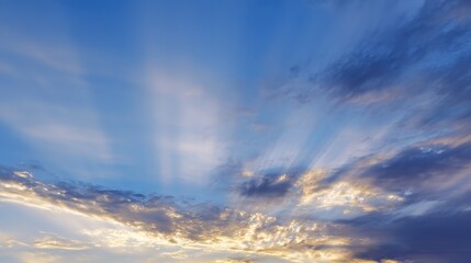 Obraz premium Serene Golden Dusk Blue Cloudy Sky Background – Warm-Cool Color Harmony, Soft Cloud Glows, Tranquil Evening Atmosphere