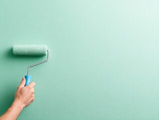 Light Mint Green Paint Roller on Wall