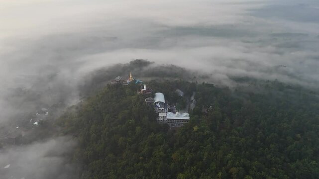 Aerial view of Wat Phra Phutthabat Pha Nam temple in Li district, Lamphun province of Thailand in morning. This place is one of the important precursor of Amphoe Li and is a viewpoint for the sunrise.