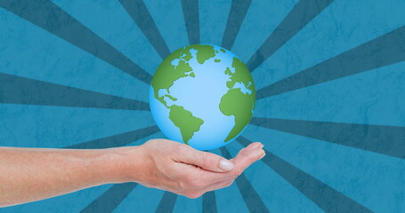Image of hand with globe over blue background