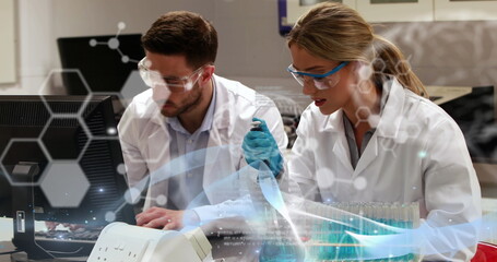 Image of data processing over caucasian scientists talking