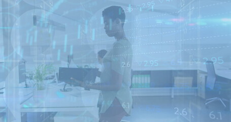 Image of financial data and graphs over afrcan american woman in office