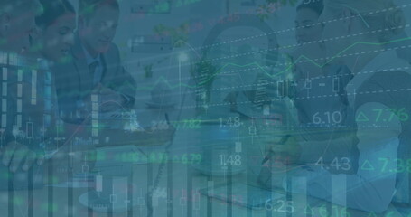 Image of financial data over diverse coworkers in office