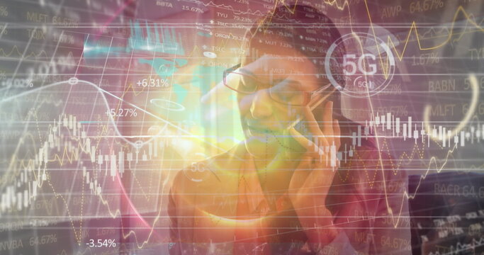 Image of data processing over caucasian businesswoman talking on smartphone