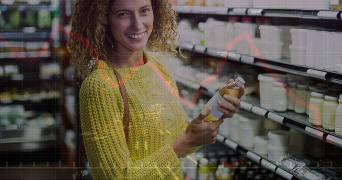 Image of financial data processing over caucasian women shopping