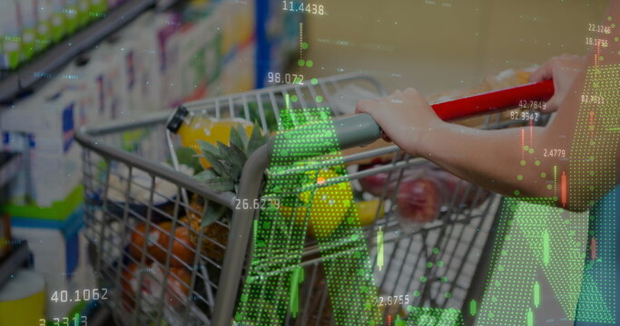 Image of financial data processing ove shopping cart