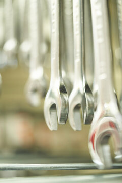 Close-up of metal wrenches in a hardware store display