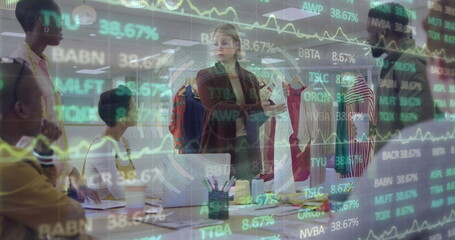 Image of financial data and graphs over diverse businesspeople in office