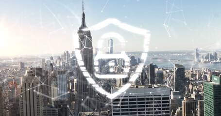 Image of shield padlock and moving digital lines and dots connections over modern cityscape