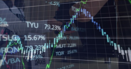 Image of stock market ticker with line graphs over customer paying for coffee through cellphone