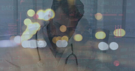 Image of illuminated lens flare and graphics over caucasian doctor writing report in hospital