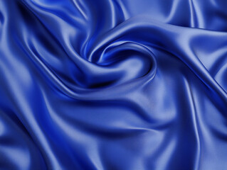 Fototapeta premium Luxurious, flowing blue silk fabric with elegant folds and a glossy sheen, creating a rich and smooth texture. 