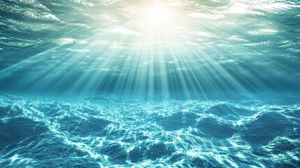 Fototapeta premium Sunbeams Illuminate Underwater Ocean Floor, Blue Water, Serene Aquatic Scene