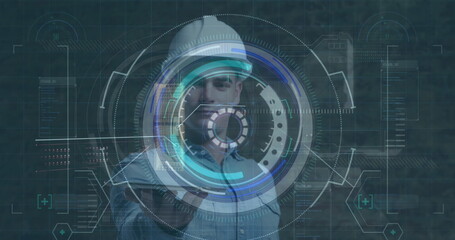 Image of scope scanning with data processing over caucasian male worker