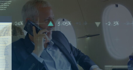 Image of data processing over caucasian businessman talking on smartphone