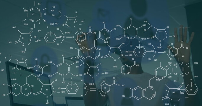 Image of chemical formulas over african american man in vr headset - Powered by Adobe