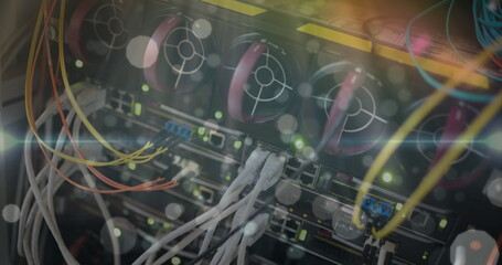 Image of dots and lights over computer wires